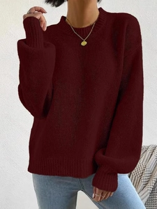 Oversized burgundy knit sweater for women with casual crew neck and long sleeves