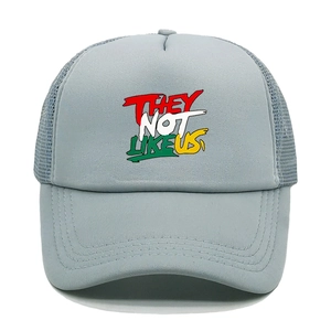 Detail of grey-blue trucker hat with breathable mesh and THEY NOT LIKE US graffiti print