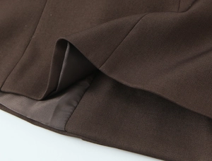 Close-up of high-density brown twill fabric texture and matching inner lining detail
