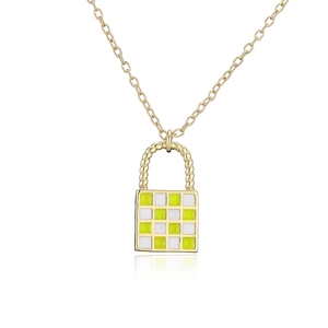Macro detail of gold checkered square lock pendant necklace with a polished finish