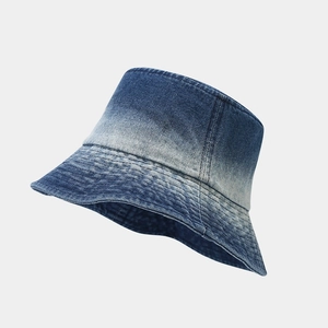 Gradient wash denim bucket hat with distressed blue shading and detailed brim stitching