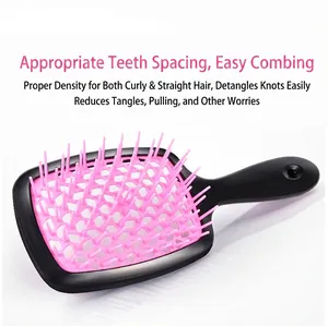 Hollow-out vented hairbrush with black frame and pink bristles for detangling and styling
