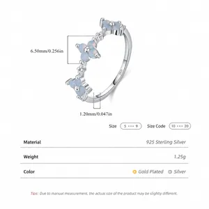 S925 sterling silver four-leaf clover ring with blue opal-style stones in gold and silver