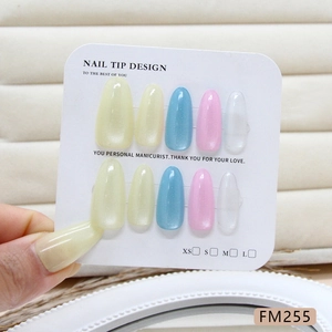 Pastel cat eye handmade press-on nails with candy glass bead finish in long oval shape