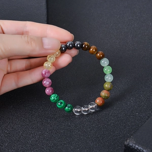 Handheld view of an 8mm multi-color gemstone bead bracelet with tiger eye and malachite
