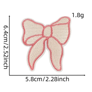 Pink and beige bow embroidery patch showing precise dimensions of 6.4cm height and 5.8cm width