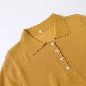 Classic polo collar ginger yellow knitted shirt with refined white button placket