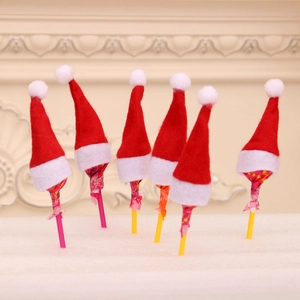 Mini red and white non-woven Christmas lollipop hats for festive holiday decoration