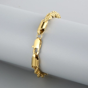 Polished golden stainless steel twisted rope chain bracelet with a secure lobster clasp