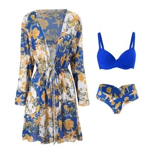 Three-piece bikini set with blue top, printed bottom, and long-sleeve sun protection cover-up