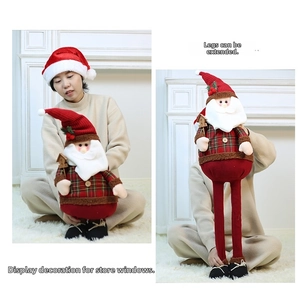 Detail of Santa Claus doll with telescopic legs for adjustable Christmas window display