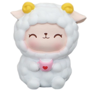 Cute white cartoon sheep figurine with yellow horns and pink heart cup for car or desk
