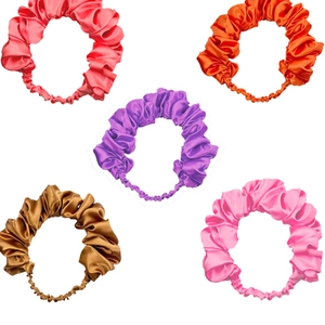 Set of five pleated satin hair scrunchies in vibrant colors displayed on a white background