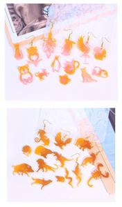 Detailed view of DIY animal silicone molds with gradient glitter resin earrings and charms