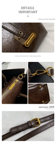 Detail of dark brown wax leather tote with bronze hardware and adjustable strap