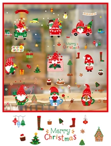 Detailed view of Christmas window clings featuring gnomes and red vintage gift trucks