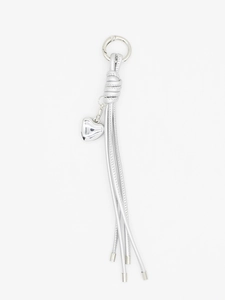 Detail of silver woven leather cord keychain with heart pendant and spring ring clasp