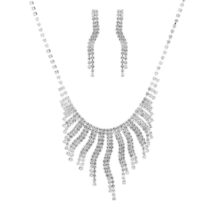 Elegant silver tassel rhinestone necklace and earring set on a clean white background