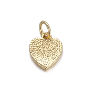Detailed close-up of 18K gold plated heart charm with hammered texture and top ring