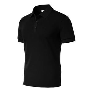 Detailed shot of men's black short-sleeved polo shirt featuring textured waffle knit fabric