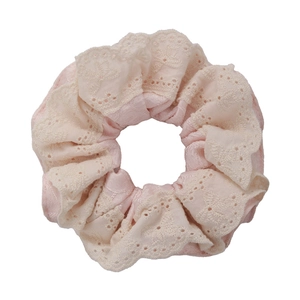 Pink and beige lace velvet scrunchies for bun hairstyles shown on white background