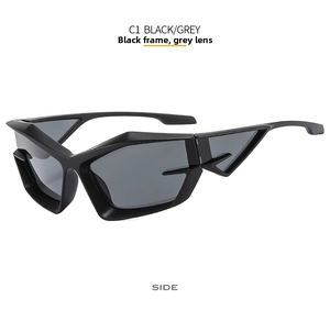 Side view of matte black futuristic geometric sunglasses with dark grey lenses and cutouts
