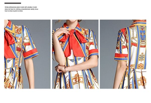 Detail of baroque print dress featuring large red bow collar and pleated waistline