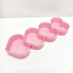 Pink heart-shaped four-grid plastic storage box with transparent lids for jewelry beads