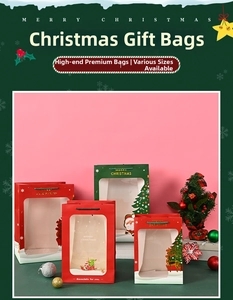 Detail of Christmas gift bags with transparent windows and festive gold stamping patterns