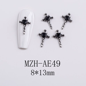 Detail of silver heart cross nail charms with black gems and model MZH-AE49