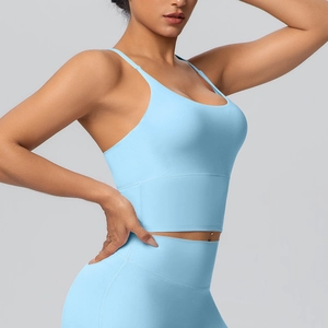 Vue latérale d'un soutien-gorge de sport bleu clair avec dos croisé et tissu élastique