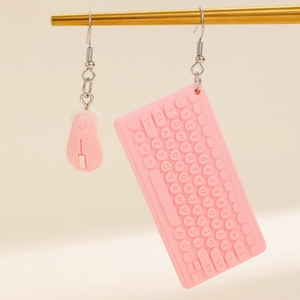 Detailed view of pink keyboard and mouse dangle earrings with metal hooks