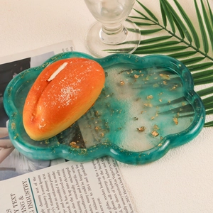 Cloud-shaped epoxy resin tray with gold foil flakes and wavy edges for home decor