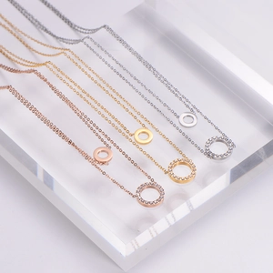 Double circle necklaces in rose gold, gold and silver finishes with micro-inlaid zircons