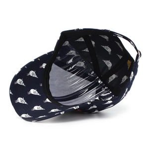 Detail view of the navy baseball cap interior showing sweatband and adjustable metal buckle