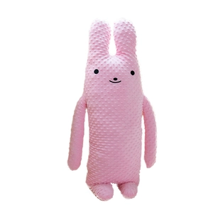 Pink plush rabbit doll with long ears and soft textured fabric for home decoration