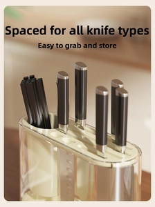 Close-up of modern kitchen knife holder with slots for metal knives and chopsticks