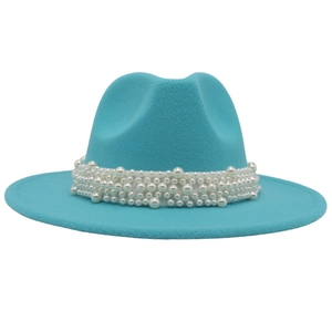 Close-up of pearl bead decorative band on a wide brim lake blue wool fedora hat