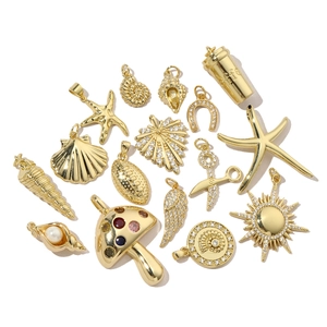 Golden sun and mushroom charms with sparkling cubic zirconia for DIY jewelry