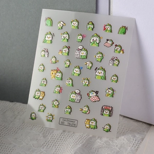 Detail view of 5D embossed dinosaur nail stickers with cute cartoon patterns and textures