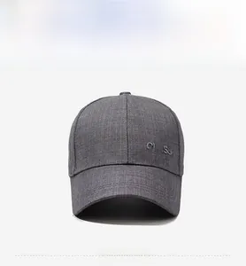 Close-up of textured grey suit fabric baseball cap featuring white CLASS embroidery detail