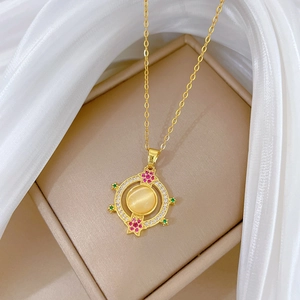 Luxurious gold titanium steel necklace with cat-eye stone and crystal compass pendant