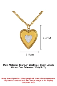 Detail view of heart shell pendant necklace in titanium steel with 45cm adjustable chain