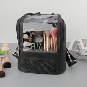 Professional black makeup bag with transparent PVC window and adjustable shoulder strap
