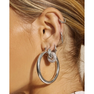 Elegant lock-shaped copper earrings with micro-set zircon on model for a luxury look