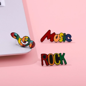 Rainbow enamel music lapel pins featuring treble clef, Music and ROCK letter designs
