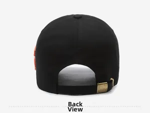 Detail view of the black denim baseball cap showing adjustable strap and bronze buckle