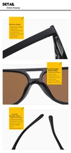 Detail of black sunglasses featuring reinforced hinges and ergonomic curved temples