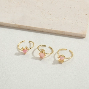Adjustable 14K gold plated ring set with pink cat eye stones and animal designs