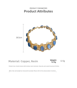 Detail view of vintage gold necklace with blue oval resin stones and 38.5cm length